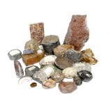 A collection of mineral fossils and hardstone specimens, including: blue john, Moroccan cuttlefish