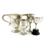 A collection of three regimental silver trophy cups, comprising: 'The Recruits Challenge Cup', by