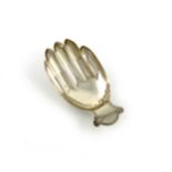 A George III silver caddy spoon, by Joseph Taylor, Birmingham 1806, modelled as a right hand,