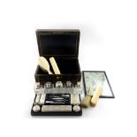 λA Victorian silver travelling dressing table set, by John Harris, London 1853, retailed by Edwards,