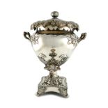 A George IV old Sheffield plated urn, unmarked, circa 1828, baluster form, with oak-leaf mounted