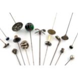 A collection of fifteen various silver hat pins, comprising: one modelled as crossed golf clubs