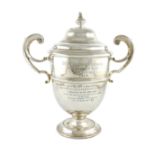 A regimental two-handled silver trophy cup and cover, by Carrington and Co, London 1913, circular