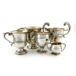 A collection of five regimental silver trophy cups, comprising 'Inter Company Falling Plate',