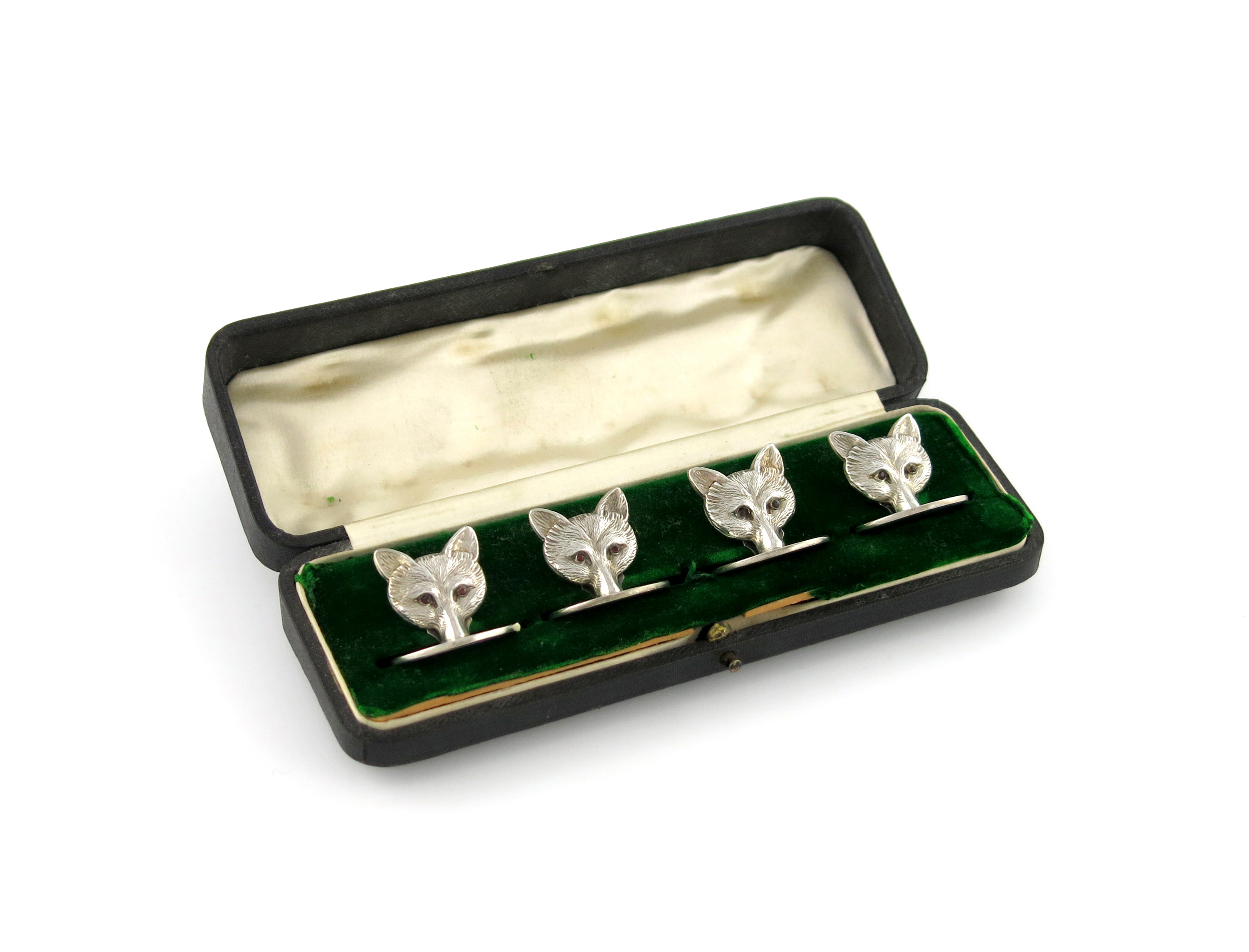 A set of four novelty silver fox mask menu card holders, by S. Mordan and Co, Chester 1913, the
