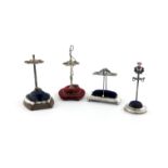 A novelty silver hat pin stand, by Crisford and Norris, Birmingham 1910, the stem modelled as a