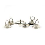 A collection of six novelty silver menu card holders, comprising: one modelled as a stag's head,