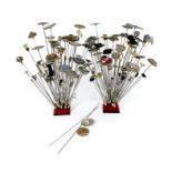 A large collection of hat pins, various materials, including: several set with paste and coloured