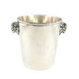 A French electroplated champagne bucket, by Christofle, tapering circular form, ribbon and reed