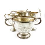 A collection of four regimental silver trophy cups, comprising: 'The Inter Platoon Athletic Club',