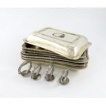 A set of three 19th century silver entrée dish bases, four covers and four handles, marks worn,