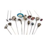 A collection of fifteen various silver hat pins, comprising: an Edwardian one modelled as a