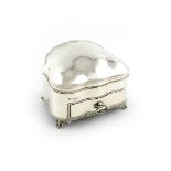 A silver dressing table box, by Nathan and Hayes, Chester 1907, shaped rectangular form, domed