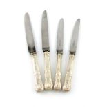 A set of eighteen silver-handled King's pattern table knives and eighteen dessert knives, by Garrard