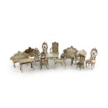 A collection of fourteen miniature silver tables and chairs, various dates and makers, comprising: