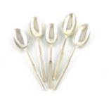 A collection of five George II and George III silver marrow spoons, comprising: a George II one,