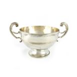 An Edwardian silver two-handled trophy bowl, by Horace Woodward & Co Ltd, London 1909, circular