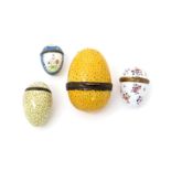 Four English enamel egg-shaped bonbonnières, c.1770 and later, the largest speckled in grey and