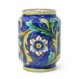 A Sicilian maiolica albarello, 18th century, the wide cylindrical body painted with six-petalled