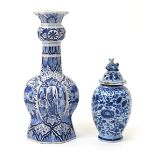 Two Delft vases, 18th century, one a small ovoid vase and cover painted in blue with an allover