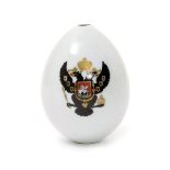 A large Russian porcelain presentation egg, 19th/20th century, painted with a version of the Russian