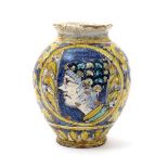 An Italian maiolica portrait bombola, 19th century or earlier, painted with a face in profile,