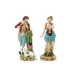 A pair of Derby figures of a shepherd and his companion, c.1810, he standing beside and leaning on a