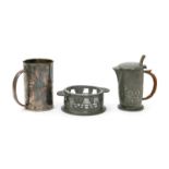 A Liberty & Co Solkets English Pewter tankard designed by Archibald Knox, model no.0334, cylindrical