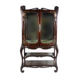 A large and impressive Art Nouveau mahogany display vitrine and stand in the manner of Emile