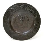 A large Newlyn Industrial Classes patinated copper charger attributed to John Mackenzie, the well