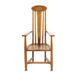 A William Birch high-back chair designed by E. G Punnett, the back with vertical slats, inset with