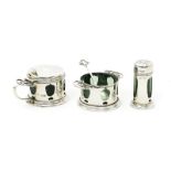 A William Hutton & Sons silver cruet set designed by Kate Harris, comprising mustard pot with hinged