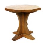 A Robert Mouseman Thompson oak Octagonal Coffee table, octagonal top on central column and four