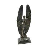 An Argentor electroplated metal figure of Icarus, modelled standing wearing a loincloth, holding a