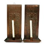 A pair of Arts and Crafts copper wall sconce in the manner of the Keswick School of Industrial Arts,