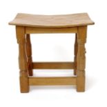 A Robert Mouseman Thompson oak Dressing Table stool, model no. CT100, rectangular bowed top on