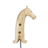 λ An Indian ivory dagger hilt, for a khanjar, Mughal, modelled as a horse's head unbridled and