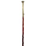 Spain: a Basque walking stick (makila), relief carved medlar wood shaft, metal ferrule impressed '