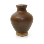 ‡ William Staite Murray (1881-1962) a stoneware vase, swollen form covered in a rust glaze to the