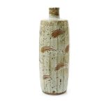 ‡ William 'Bill' Marshall (1923-2007) a tall cut-sided stoneware bottle vase, shouldered cylindrical