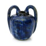 A Martin Brothers stoneware vase with serpent handles by Edwin & Walter Martin, dated 1900,