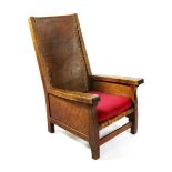 A Robert Mouseman Thompson Smoker's chair, with leather slung back, lattice leather seat and