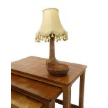 A Robert Mouseman Thompson oak table lamp, tapering octagonal column with carved leaf motif and