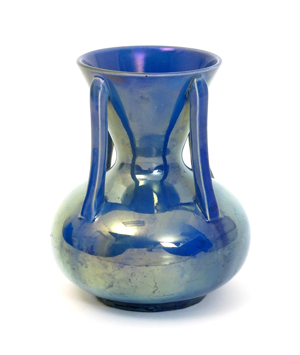 A rare Carter's Poole Pottery lustre vase probably designed by Owen Carter, ovoid with flaring