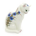 A Plichta model of a cat by Joe Nekola, modelled seated with applied glass eyes,, painted with
