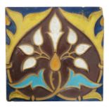 An early Minton & Co Prosser's patent tile, press moulded with a stylised floral panel in colours,