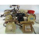 An assortment of various vintage telephone sets to include Bakelite cased examples