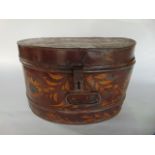 A large 19th century barge ware type painted tin hat box with decoration of sunflowers etc