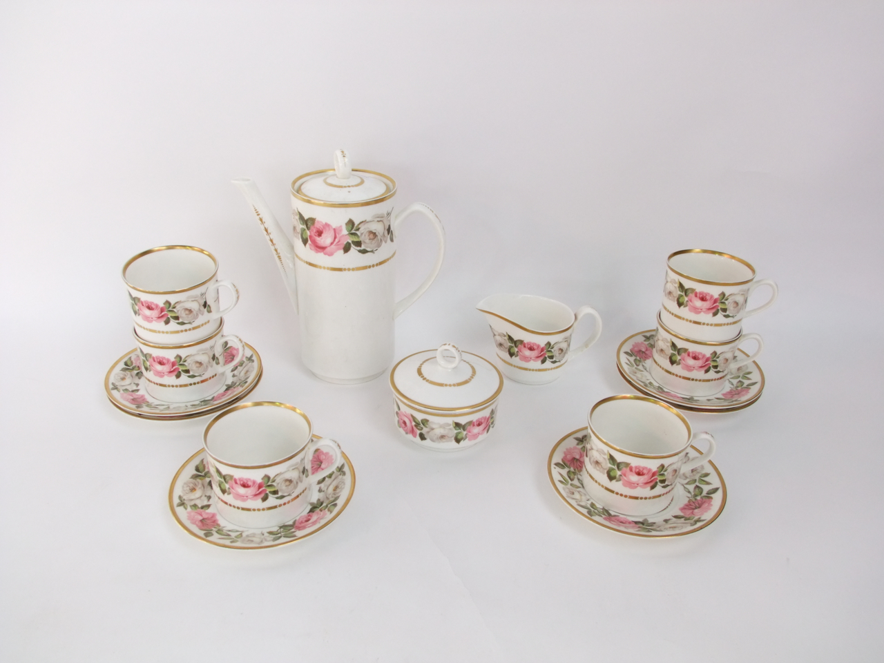 A collection of Royal Worcester Royal Garden pattern coffee wares comprising coffee pot, covered