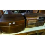 A vintage Pye "The Black Box" mains record player with veneered case together with a further vintage